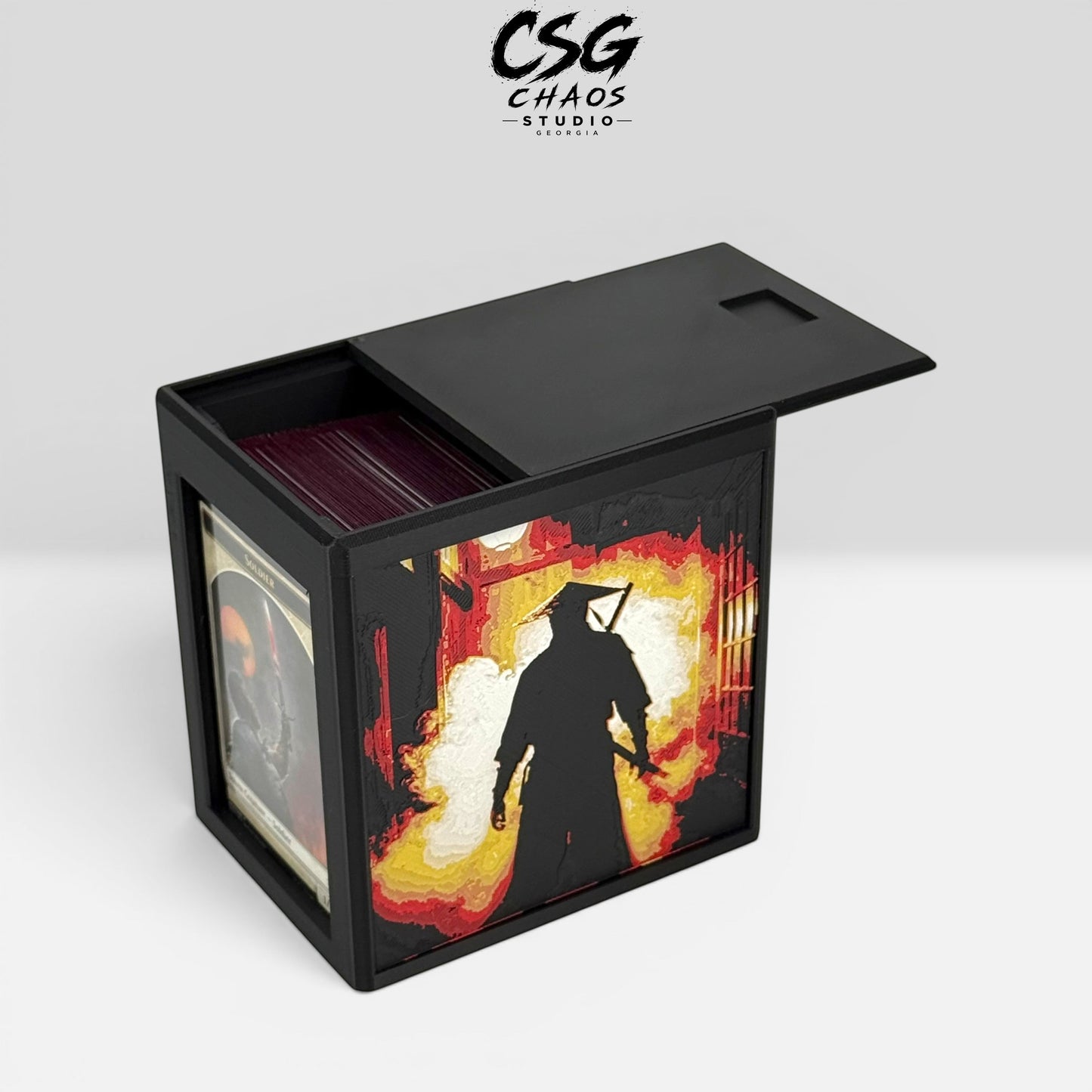 Commander deck box open showing 115-card double-sleeved capacity and Commander display window — Chaos Studio Georgia