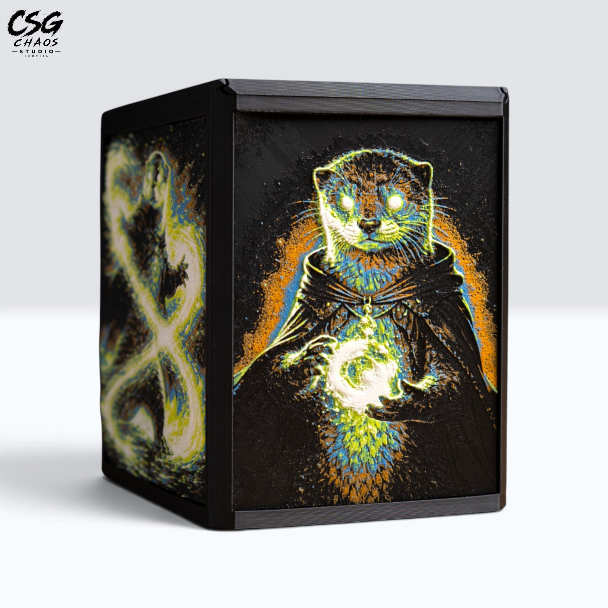 MTG Commander Deck Box PRISM Series, corner angle with mystical otter mage panel art on black — Chaos Studio Georgia