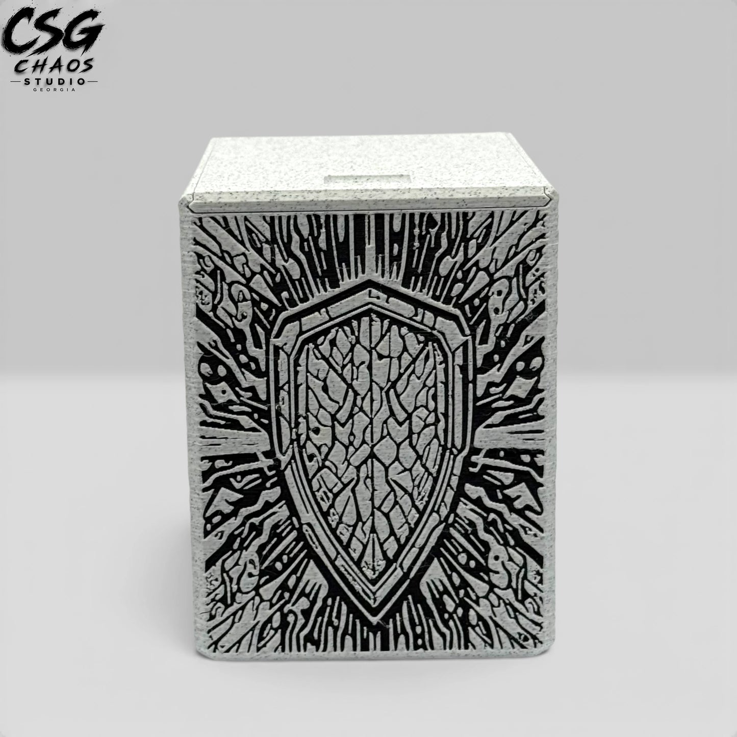 MTG commander deck box PILLAR side panel — battle-worn heraldic shield detail — Chaos Studio Georgia