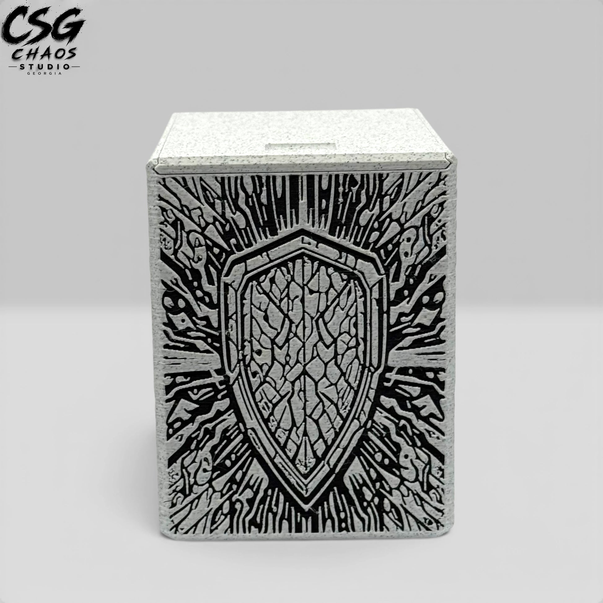 MTG commander deck box PILLAR side panel — battle-worn heraldic shield detail — Chaos Studio Georgia