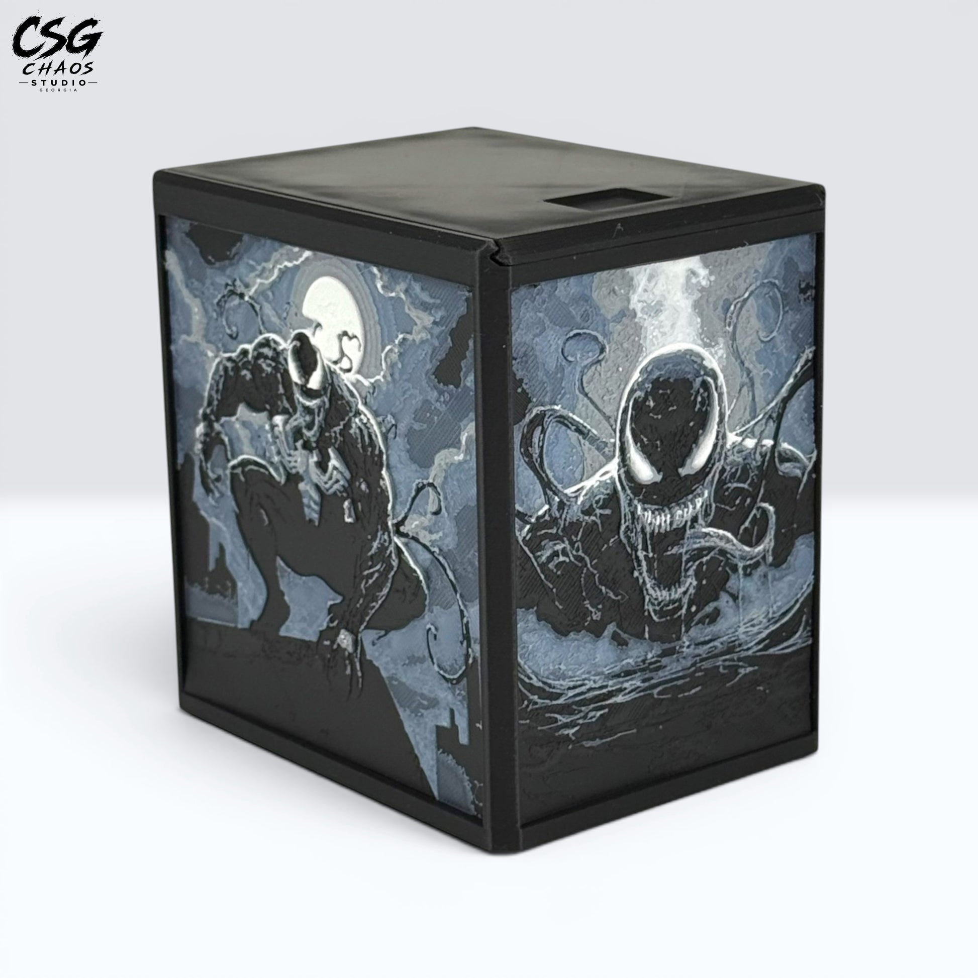 MTG Commander Deck Box PRISM Series, angled view of dark symbiote antihero moonlit panel art on white background — Chaos Studio Georgia