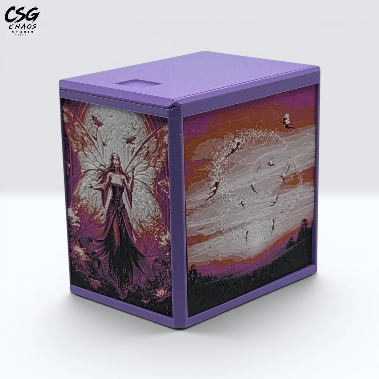 MTG Commander Deck Box PRISM series, angled view of fairy queen and sunset sky panels in purple frame — Chaos Studio Georgia