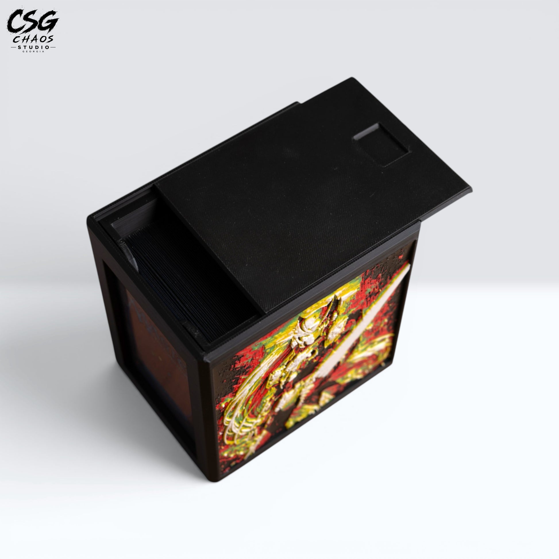 MTG Commander Deck Box PRISM Series, top-down view with lid open showing sleeved cards inside — Chaos Studio Georgia