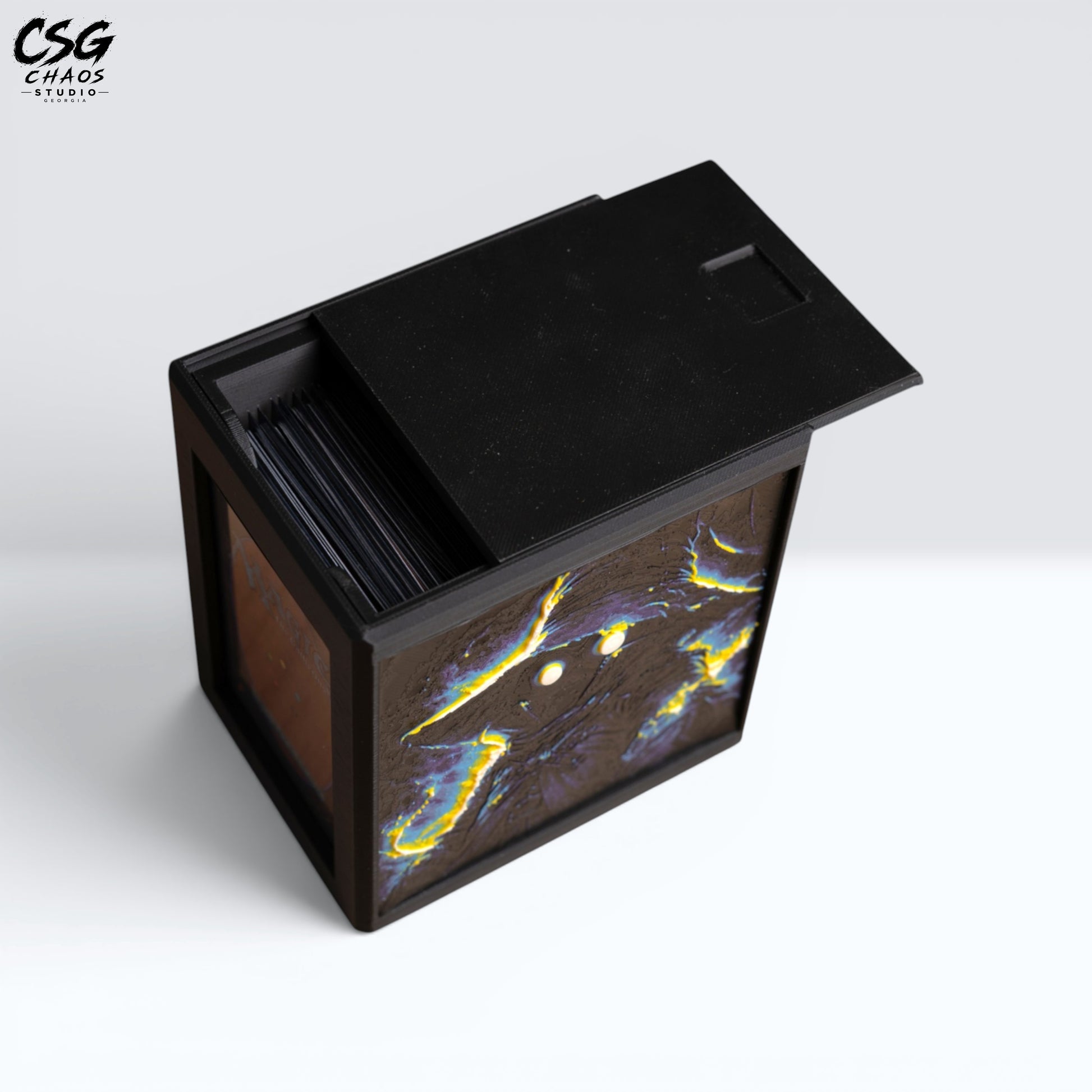 MTG Commander Deck Box PRISM Series, open lid view with removable lid set beside stored cards on white background — Chaos Studio Georgia