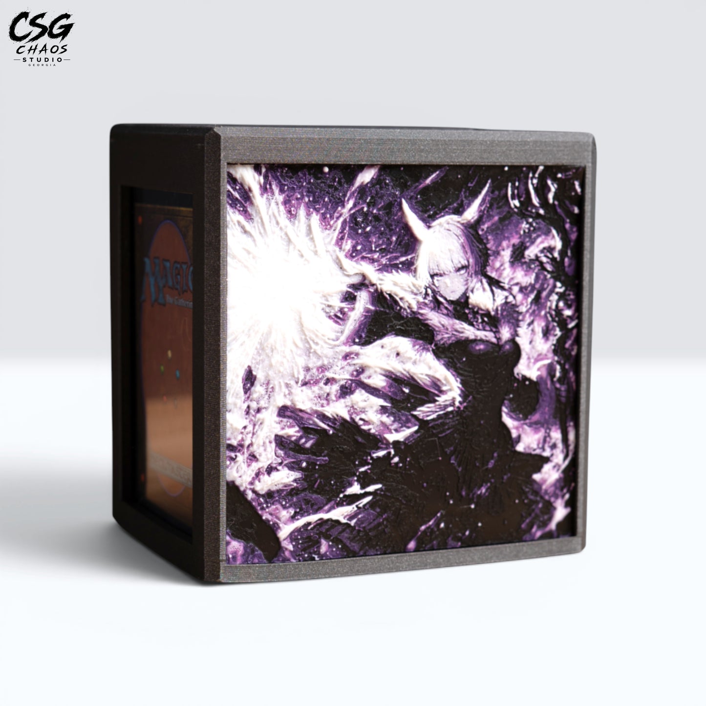 MTG Commander Deck Box PRISM Series, front view of horned sorceress casting a glowing spell on white background — Chaos Studio Georgia