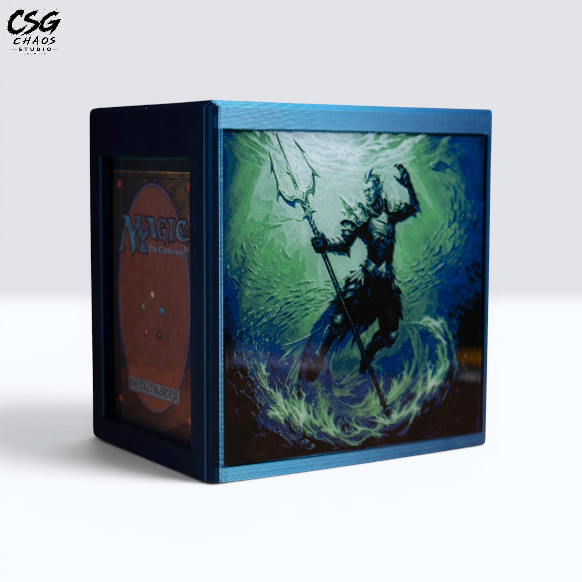 MTG Commander Deck Box PRISM Series, front view of sea deity guardian art on a branded dark backdrop — Chaos Studio Georgia