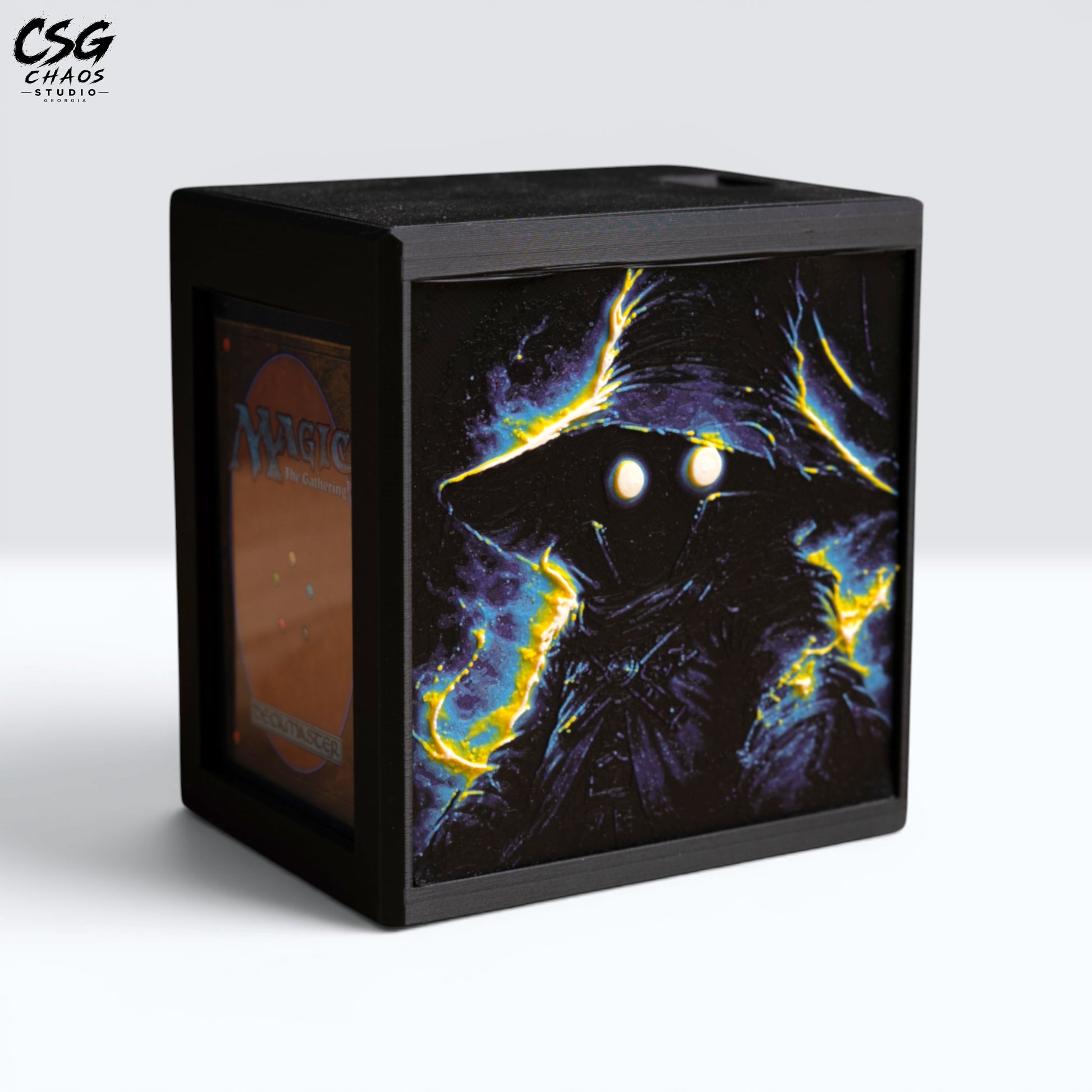 MTG Commander Deck Box PRISM Series, front view of hooded spellcaster casting glowing lightning on white background — Chaos Studio Georgia