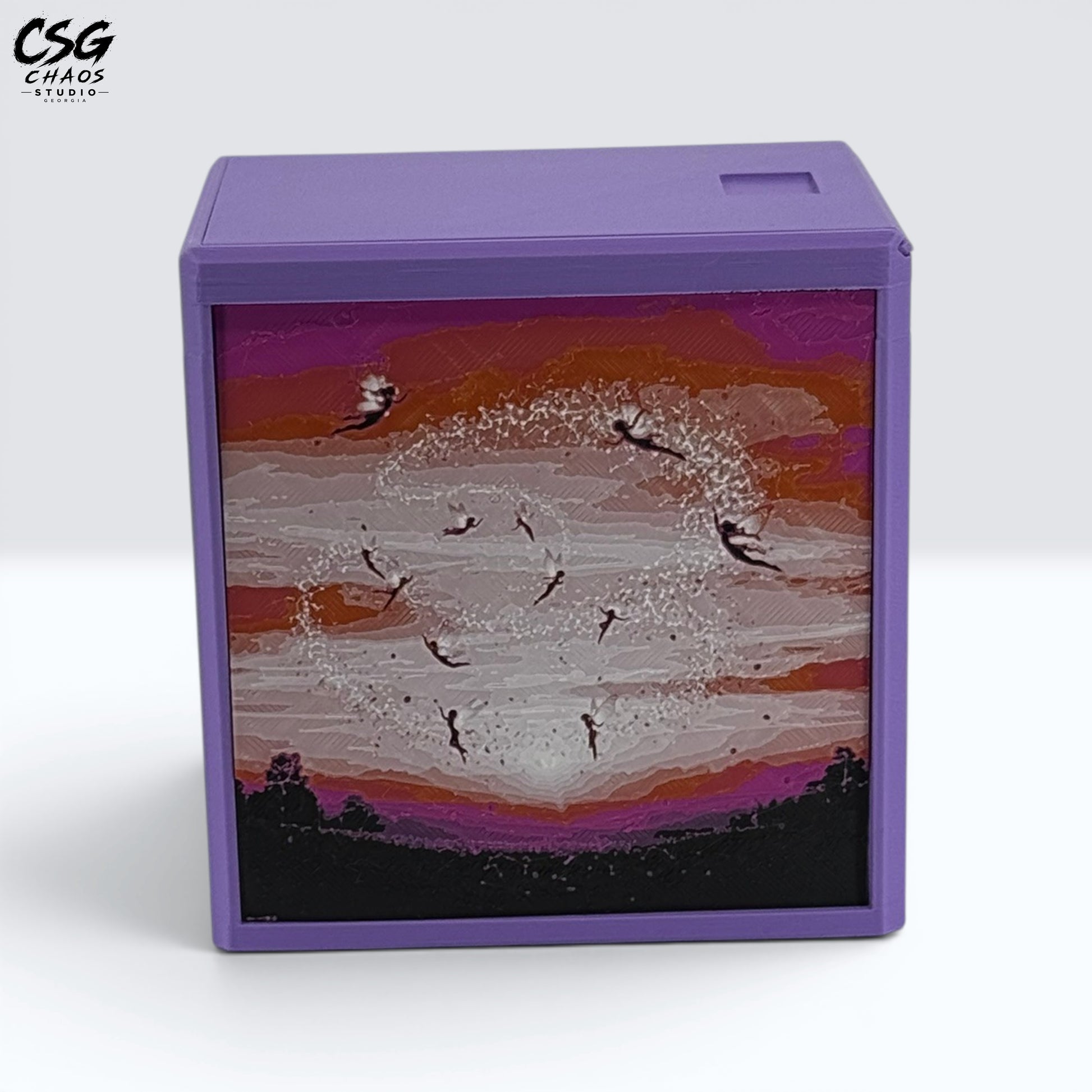 MTG Commander Deck Box PRISM series, front view of the sunset sky panel with fairy silhouettes — Chaos Studio Georgia