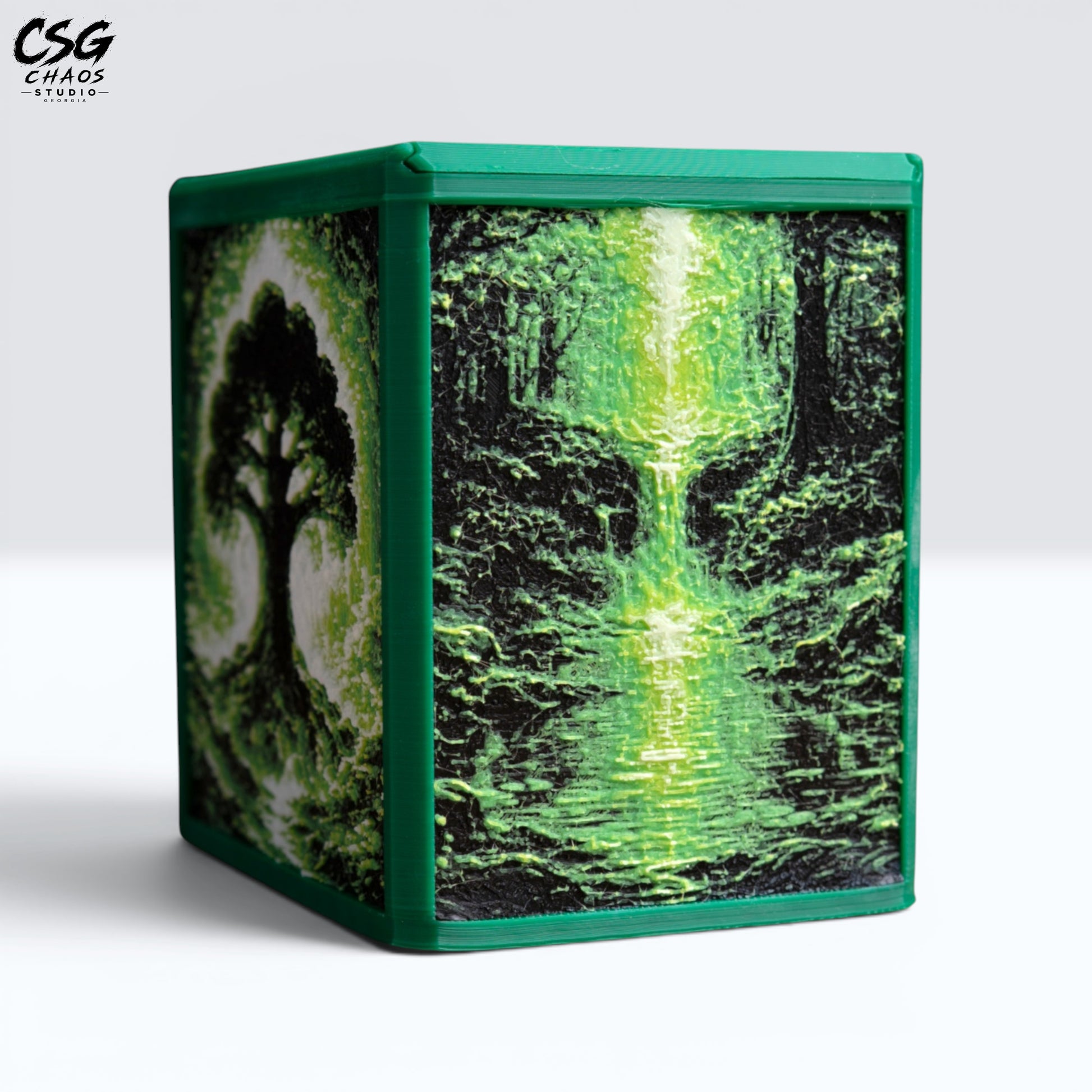 MTG Commander Deck Box PRISM Series, corner view with glowing tree-of-life art in green — Chaos Studio Georgia