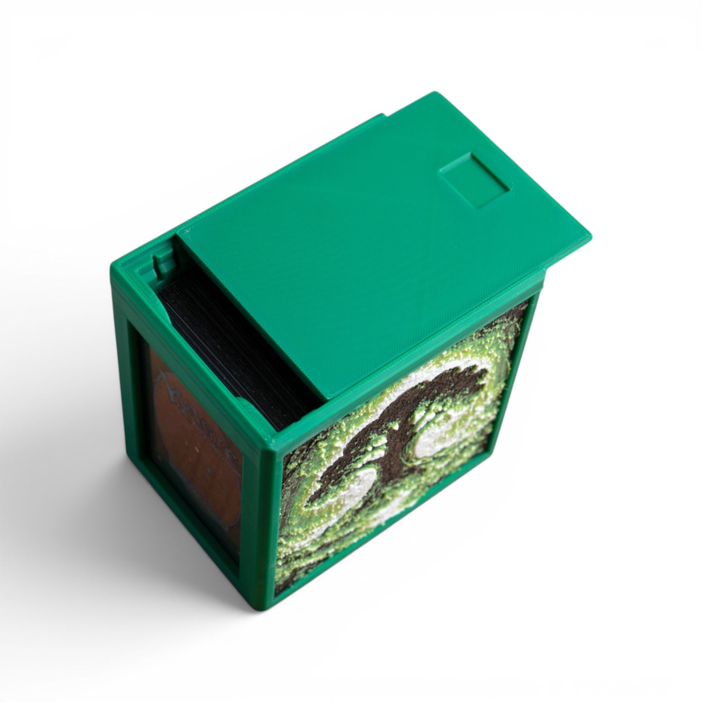 MTG Commander Deck Box PRISM Series, top-down view with lid open showing card slot and tree art panel — Chaos Studio Georgia