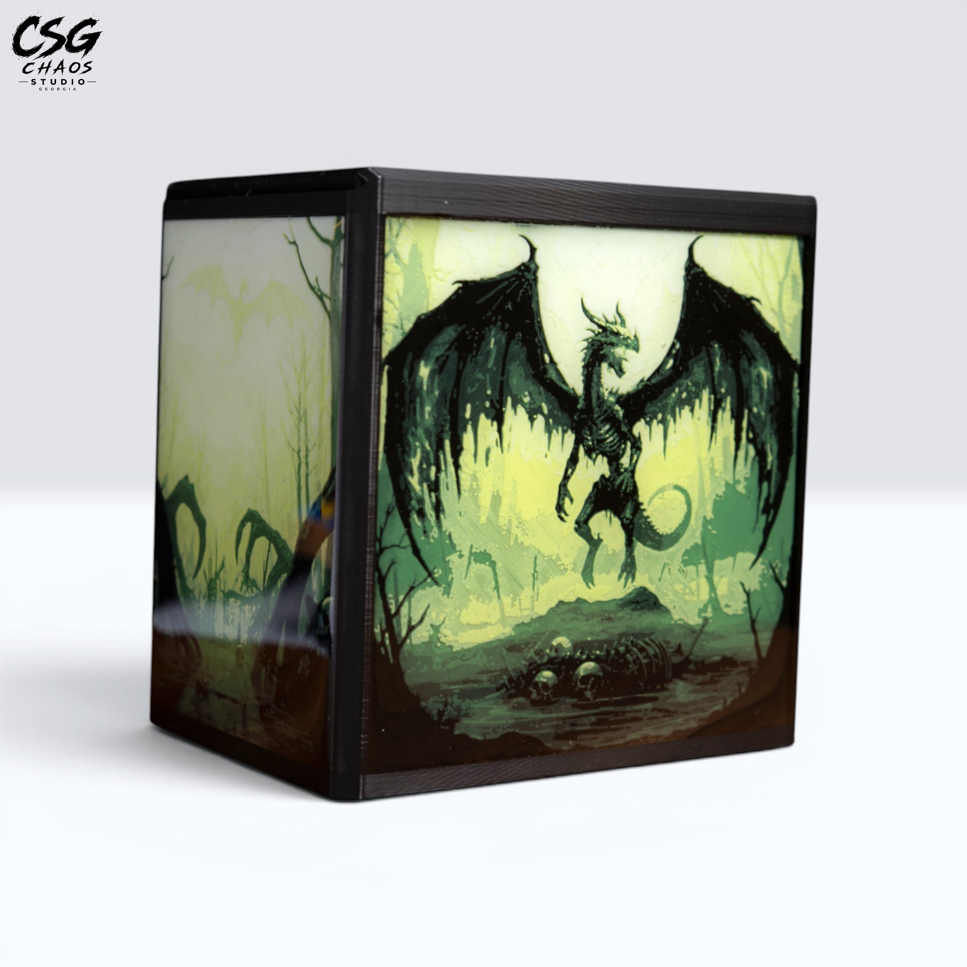 MTG Commander Deck Box PRISM Series, corner view with skeletal dragon art over a glowing swamp — Chaos Studio Georgia
