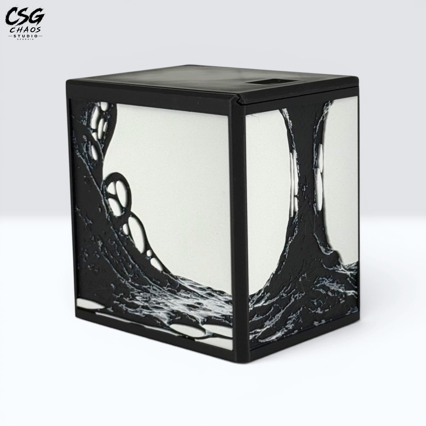MTG Commander Deck Box PRISM Series, angled view of dripping black ooze panel art on white background — Chaos Studio Georgia