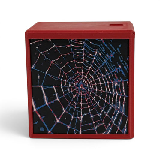MTG Commander Deck Box PRISM Series, front view of spider web pattern in red, white and blue — Chaos Studio Georgia