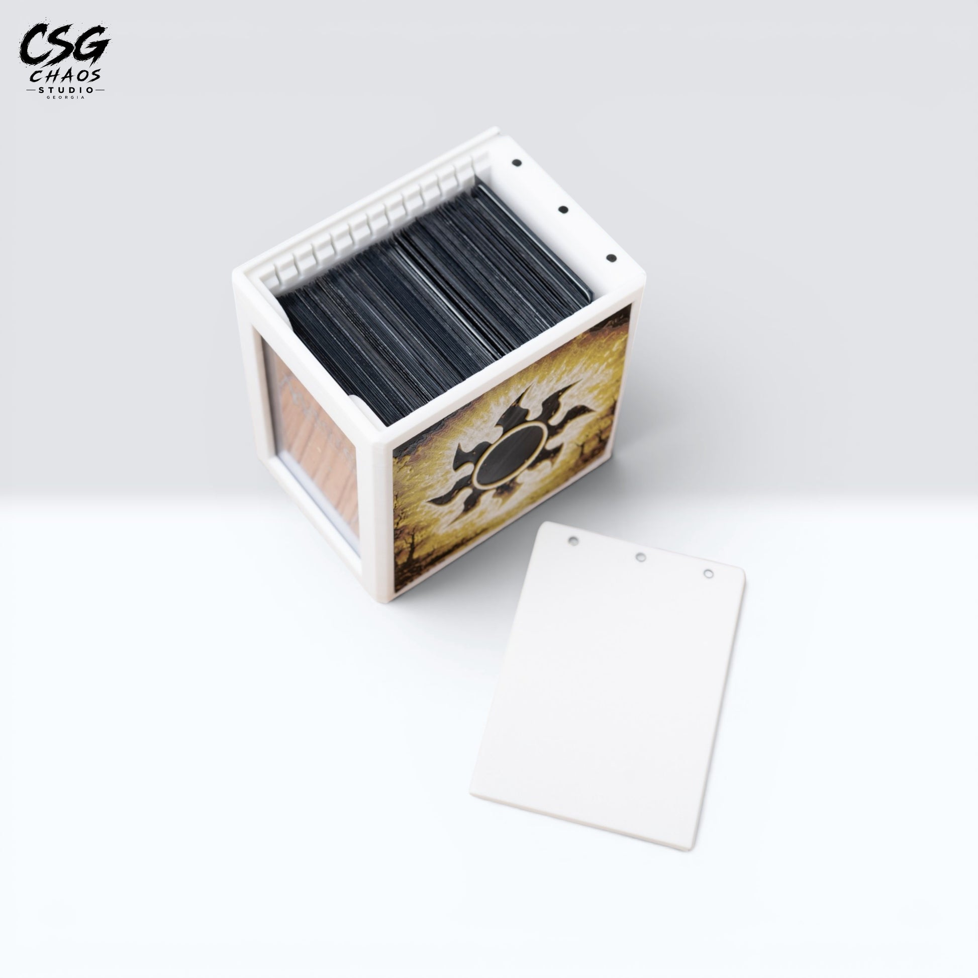 MTG Commander deck box with lid removed beside it, showing the internal divider and white frame — Chaos Studio Georgia