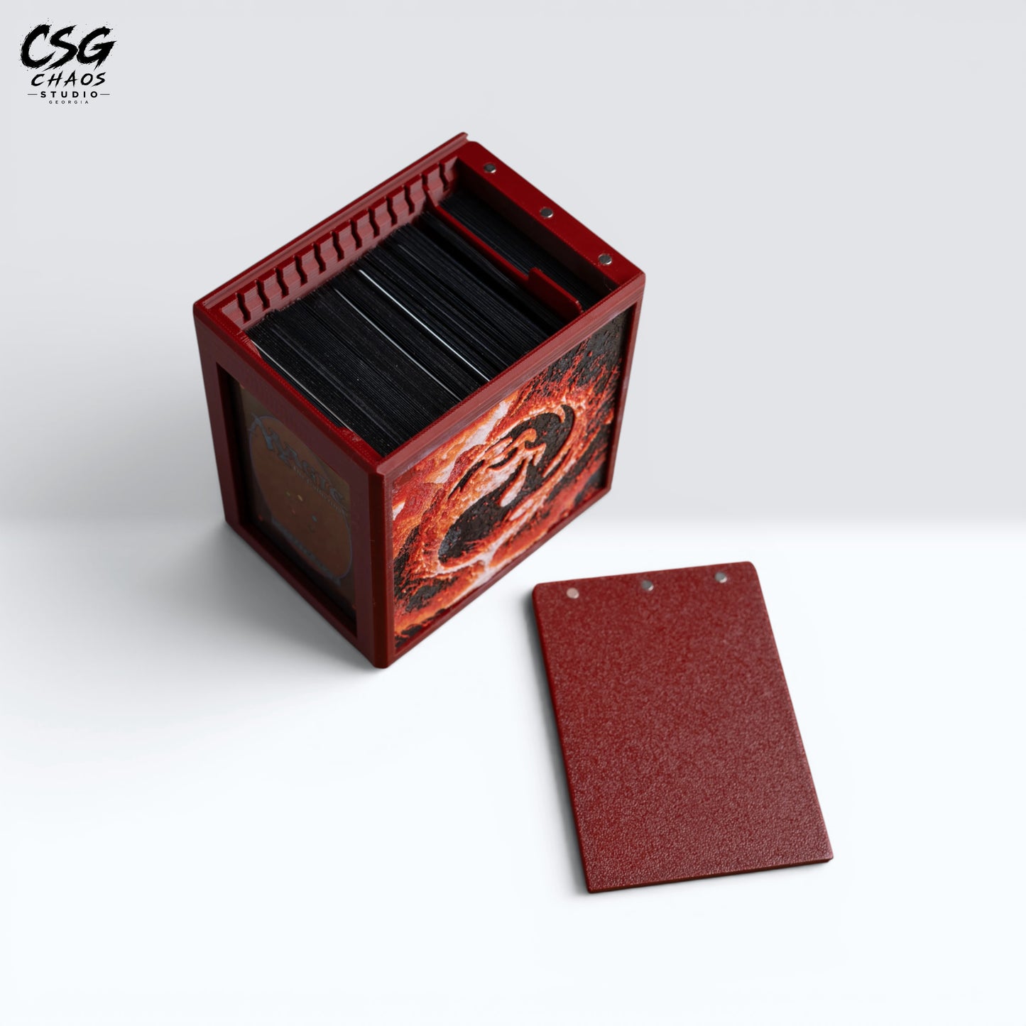MTG Commander deck box with lid removed beside it, showing the internal divider and red frame — Chaos Studio Georgia